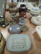 An assortment of studio pottery and ceramics.