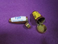 two vintage brass vesta cases.