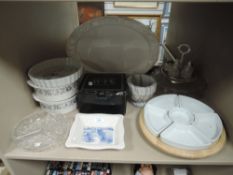 A mixed lot of items including serving dishes, flan dish, platter and a box of mugs and more.