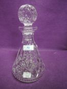 A Waterford crystal decanter.