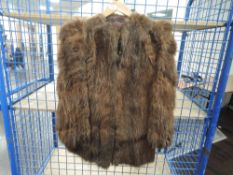 A 1940s fur cape having utility label,fully lined.