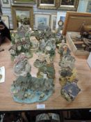 A large lot of clocks in the form of various cottages and houses.