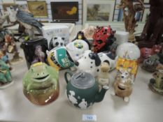 Fifteen money boxes in various styles and deigns including Sadler pig,Darth Maul Lucas films ltd,