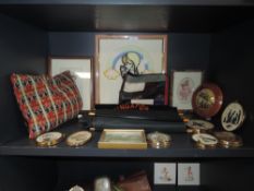 A mixed lot containing a selection of frames and miniatures,tourist collectables and more.
