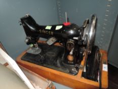 A vintage Singer 99K sewing machine.