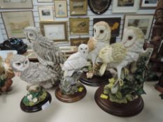 A selection of Country Artist Owl figures including Barn and Little