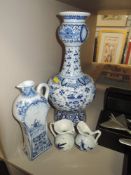 A selection of blue and white delft vase and jugs.AF