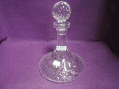 A Waterford crystal decanter.