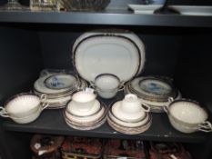 A part Aynsley Leighton dinner service having white ground with royal blue edge and gilt motif