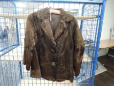 A vintage ladies fur coat, feels to be pony or similar, chestnut brown in colour and fully lined.