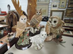 A selection of figures by Country Artists Owl figurines including Barn and Long eared