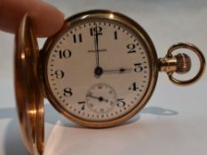 A 9ct gold Hunter top wound pocket watch by Waltham no: 19017017, having Arabic numeral dial with