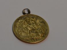 An 1887 gold sovereign with attached yellow metal pendant loop, approx 7.7g