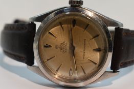 A gents Tudor Oyster Royal automatic wrist watch having a baton numeral dial to champagne coloured