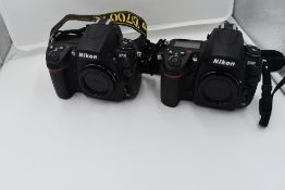 A selection of Nikon cameras and lenses in a hard Peli 1600 case. Two Nikon D700 camera bodies, a