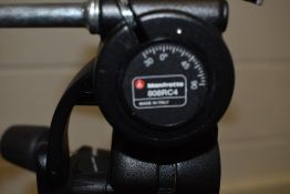 A Manfrotto 055CX Pro4 tripod in soft carry bag