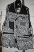A Wychwood long fishing vest,unused with tags, size large.
