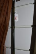A three peice 10ft split cane fly rod with spare tip in canvas sleeve