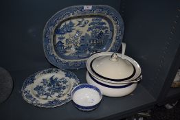 A assortment of blue an white ware including large platter and tureen with lid and matching ladle.