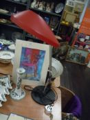 A retro styled adjustable desk lamp.