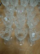 A selection of clear cut and crystal glass claret or wine glasses in the Victoria design by Stuart
