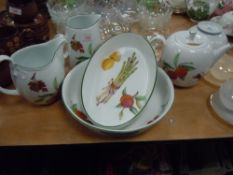 A selection of Royal Worcester table and kitchen wares in the Evesham Vale design