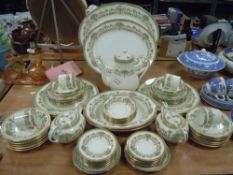 A large collection of Aynsley Henley having floral transfer pattern wit gilt detailing including