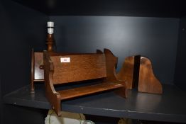 Two vintage Book troughs and a set of wooden book ends, also included is a turned lamp base.