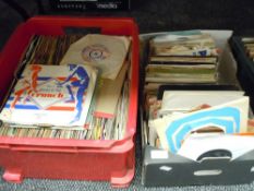 A box full of 45rpm singles,mixed interest including rock, rock and roll and easy listening.