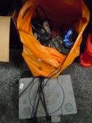 A selection of grey Playstation games and console