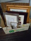 A box of frames,mirrors and similar.