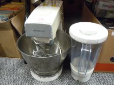 A Kenwood Chef kitchen aid with accessories
