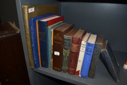 A variety of books including wild flower interest and vintage novels.