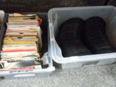 A box full of 45rpm singles,mixed interest including Dire straits, UB40 and more.