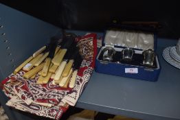 A collection of vintage knives and forks and a boxed cruet set with Bristol blue liners in box.
