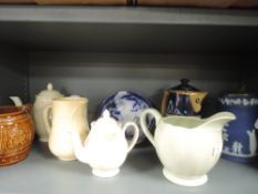 A varied lot of vintage ceramics and glass including jugs, tea pots and lidded jugs
