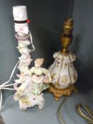 Two ceramic lamp bases including hard paste figural hand decorated and similar squat with gold