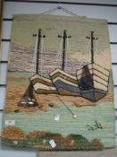 A wool wall hanging depicting a Whitby bay boat scene.