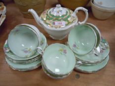A selection of Paragon tea wares including Violetta tea cups and pompadour tea pot