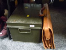 A vintage metal deed case and leather bound satchel