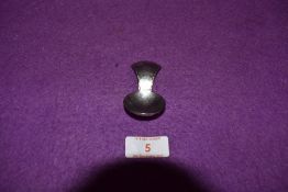 A Keswick school of industrial arts caddy spoon having hammered detailing, marked underside KSIA