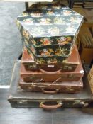 Four vintage suit cases(one leather) in various sizes and a Marshall and Snelgrove hat box.