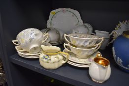 A mixed lot of ceramics including Royal Doulton Symphony double handled cups and saucers,plates