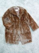A good quality vintage fur coat.medium size.