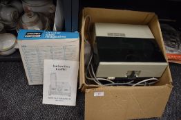 A Boots projector and a Gnome Rotary slide magazine.