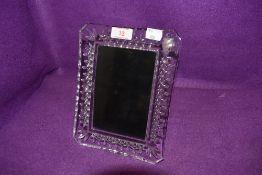 A Waterford crystal photo frame.