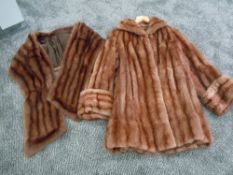 A good quality vintage fur coat and a stole.medium size.