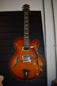 An Ibanez archtop guitar Artcore AF86 -VLS-12-01 Vintage Sunburst? Serial number SO6064324