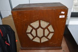 An early 20th Century oak speaker cabinet containing Celestion speaker