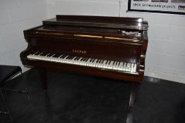 A traditional mahogany cased baby grand piano , labelled Dagmar